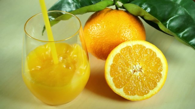 Orange juice with orange fruits