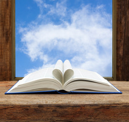 book heart shape page open window sky view