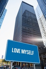 Fototapeta na wymiar Love myself against skyscraper in city