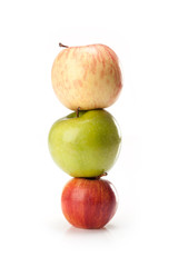 different varieties of apples isolated on white background