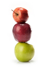 different varieties of apples isolated on white background