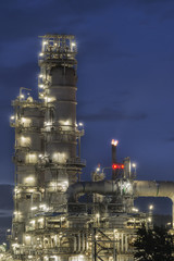 Oil refinery along twilight sky