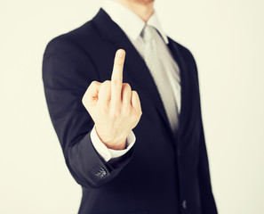 man showing middle finger