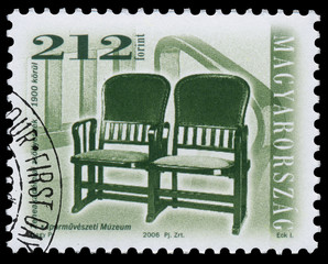 Obraz premium Stamp printed in Hungary shows antique chair