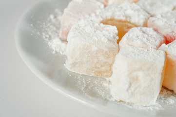 Fototapeta na wymiar Turkish Delight closeup in powdered sugar