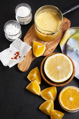 orange juice on dark. cooking ingredients. potato starch and sug