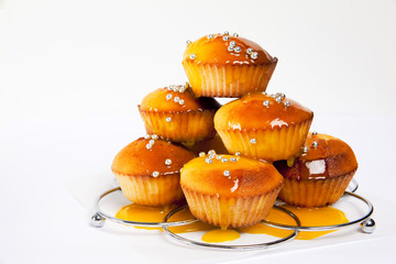 vanilla muffin with hot orange custard isolated on white