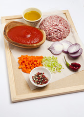 ingredients for make ragu bolognese: mince meat , tomato sauce,