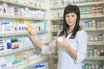 A Woman pharmacist at the pharmacy place