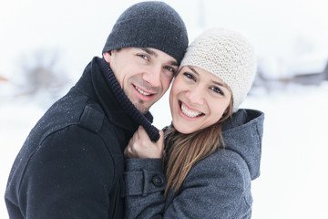 A Young Couple outside in the winter season