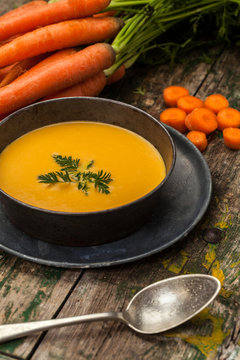 Carrot Cream over a Wood Background
