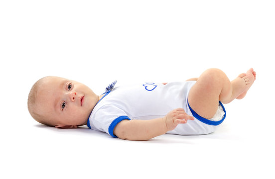 Baby Boy Lying On White Floor