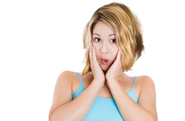 Closeup portrait of surprised beautiful blonde woman 