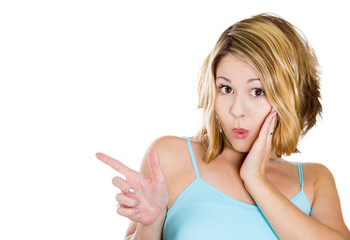 Fototapeta premium Portrait shocked woman pointing finger at someone 