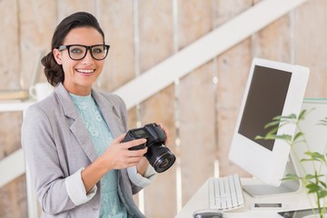 Stylish brunette working from home