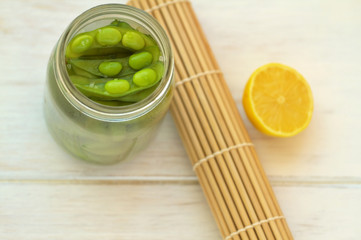 Edamame, soy beans on a vintage wooden background