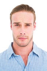 Fototapeta premium Portrait of doubtful man in shirt