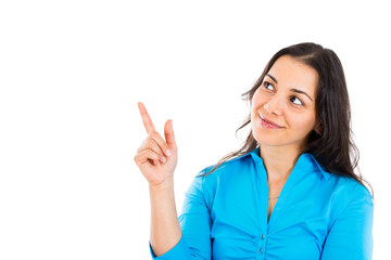 young woman pointing finger at blank copy space presenting 
