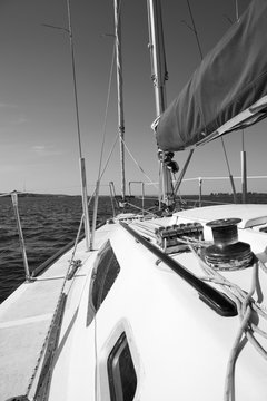 Monochrome picture view on deck of sailing yacht