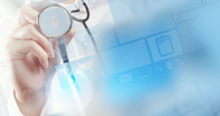 Medicine doctor hand working with modern computer interface as m