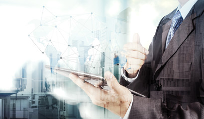 Double exposure of businessman working with new modern computer