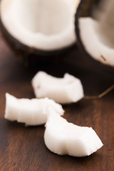 close up of a coconut on a wooden background