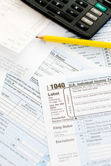 Obraz premium Taxes: Focus on 1040 Tax Form