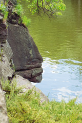 The rock on the bank of the lake