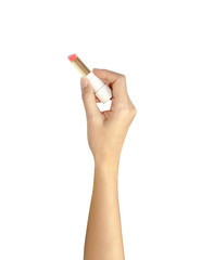 hand of women gripping lipstick in writing action over