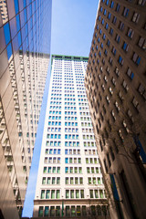 Fototapeta na wymiar Highrise buildings in Wall Street financial district, New York