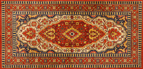 Old Persian red carpet with pattern