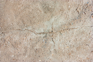 Cement floors are old and dirty.