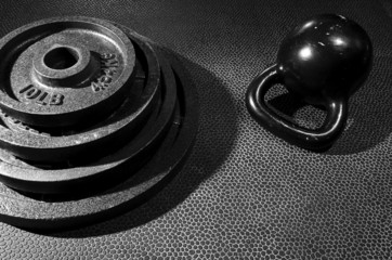 Plates stacked and kettle bell