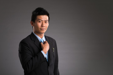 Confident Vietnamese businessman