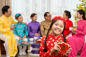 Girl with traditional cake