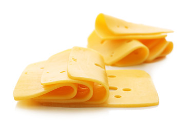 Sliced cheese isolated on white background