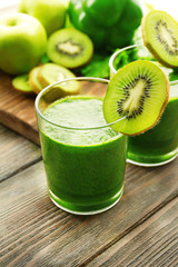 Green fresh healthy juice with fruits and vegetables