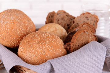 Tasty bread on table on light background