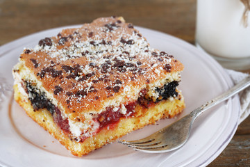 Homemade pie with jam and glass of milk
