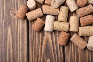 Wine corks on wooden background