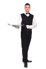 Young person in a suit holding an empty tray isolated on white b