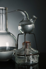Fixed laboratory glassware on dark  background