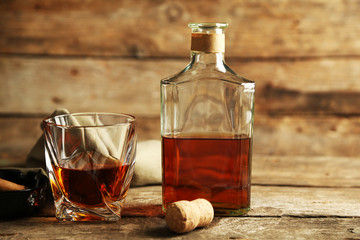 Whiskey on wooden background