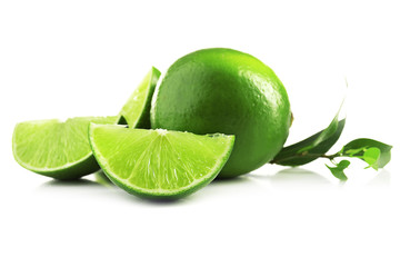 Juicy lime with green with leaves isolated on white