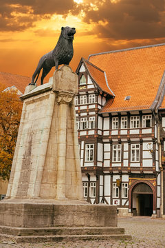 Lion statue and old timbered house in Braunschweig