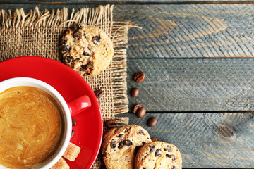 Cup of coffee and tasty cookies
