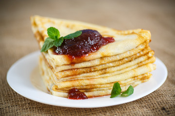 many thin pancakes with jam