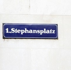 road sign with the name of the square in vienna