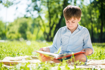 Boy in summer park
