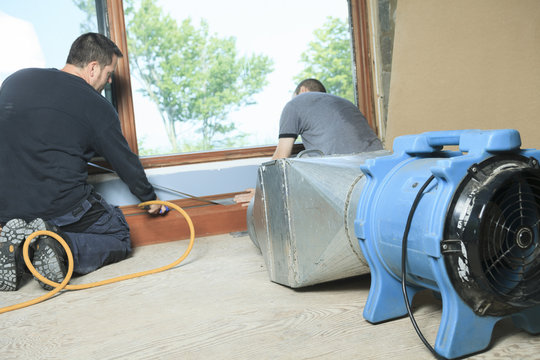 A Ventilation cleaner working on a air system.